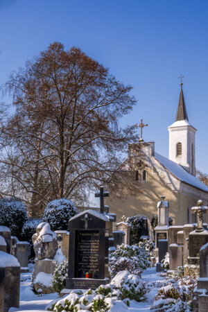 SCHROBENHAUSEN, GERMANY - DECEMBER 17: Snow in the landmarked historic cemetery in Schrobenhausen, Germany on December 17, 2022のeditorial素材