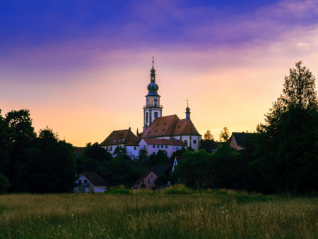 Sunset at the church of the town Stadtsteinach (Franconia)の写真素材