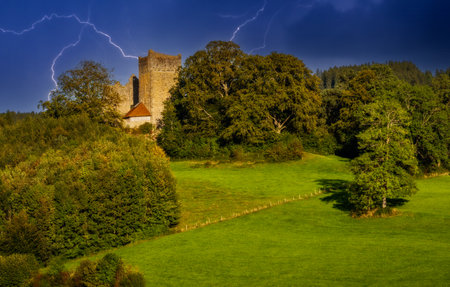 Medieval ruin of Sulzberg castle in the AllgÃ¤u (Germany, Bavaria) during a thunderstormのeditorial素材