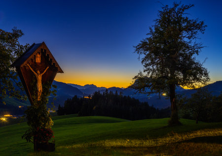 Mountain landscape in the alps of Austria during sunsetの写真素材