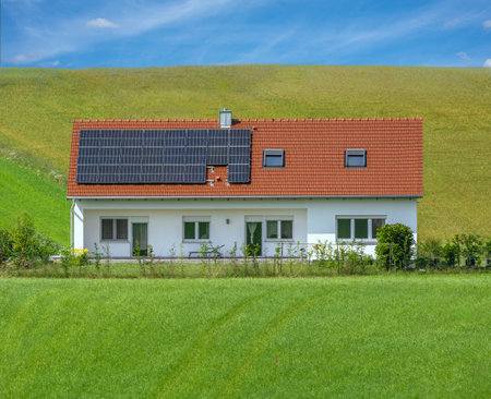 Generic innovative House with photovoltaic on the roof (Building and surroundings modified by image editing)の写真素材