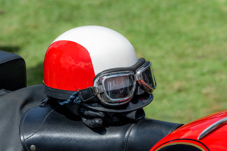 Old white vintage motorcycle helmetの写真素材