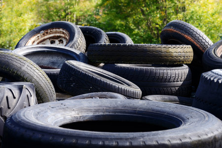 Heap of old tyres collected for receyclingの写真素材