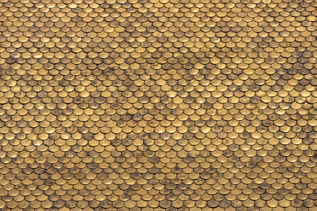 Abstract pattern with golden roof tilesの写真素材