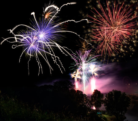Firework display on the night sky at a festivalの写真素材