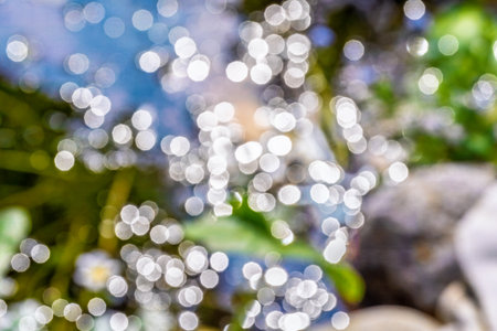 Abstract bokeh background with light reflectionsの写真素材