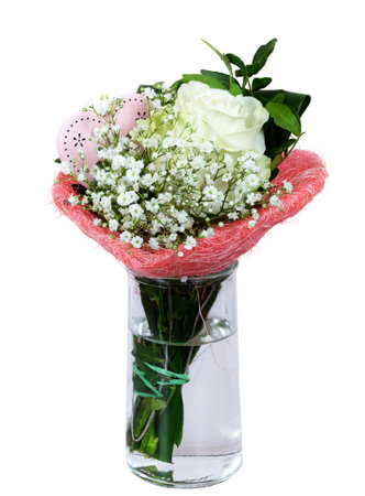 Closeup of an isolated flower arrangement in a glass vaseの写真素材