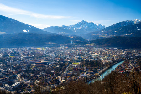 Viiew over Innsbruck city, the Inn river and the alpsの写真素材