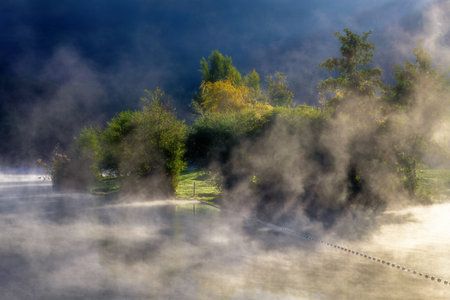 Foggy morning at lake KratzmÃ¼hlsee in the AltmÃ¼hltal valleyの写真素材