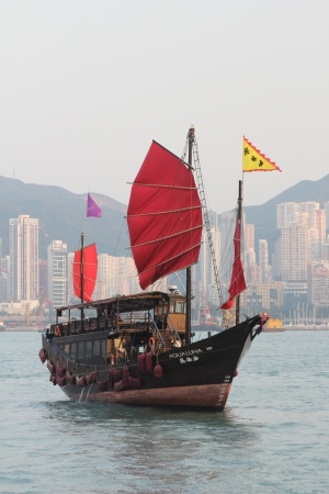Hong Kong harbour with tourist junk のeditorial素材