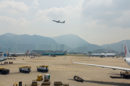 A United airline plane departure on Oct 9, 2013 from the Hong Kong International Airport  About 90 airlines operate flights from HKIA to over 150 cities across the globe  のeditorial素材