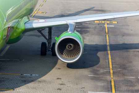 HONG KONG - DEC 29, 2013  Engine of a S7 Airlines flight in Hong Kong International Airport  About...