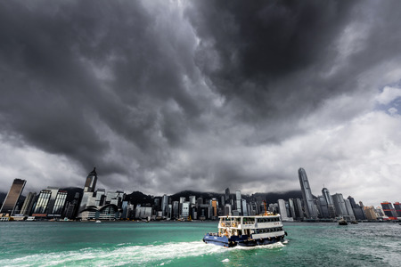 View of Victoria harbor just before a tropical cyclone  During summer, typhoons regularly skirt the city, causing varying degrees of damage including injuries and deaths のeditorial素材