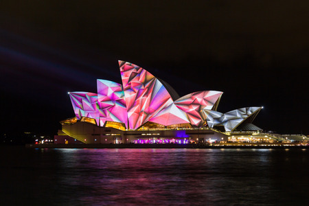 Sydney Opera House lit with vibrant colors patterns and moving imagery during the annual Vivid Sydney festival  のeditorial素材