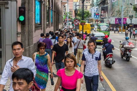 Crowded streets in Macau  Chinese tourists are the main resource in macau tourism industry now  