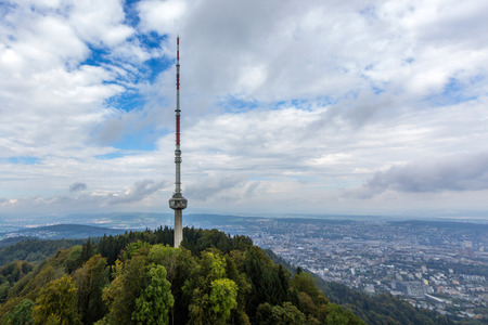 Uetliberg TV-tower and view of city of Zurich in Switzerland.のeditorial素材