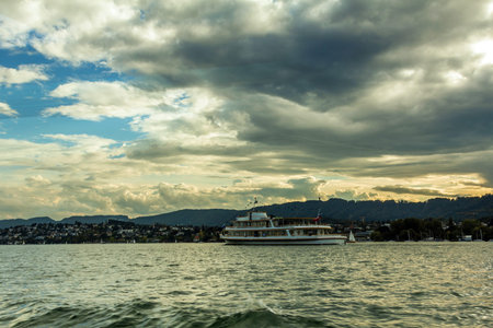 A Ferry in Zurich Lake at Sunset
