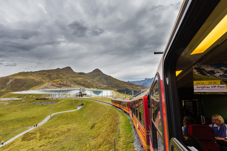 The Jungfrau railway is a metre gauge rack railway which runs 9 km from Kleine Scheidegg to the highest railway station in Europe at Jungfraujoch.のeditorial素材