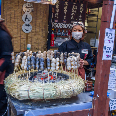 A dango shop at Mt. Takao in Tokyo. Dango is eaten year-round, but the different varieties are traditionally eaten in given seasons.のeditorial素材