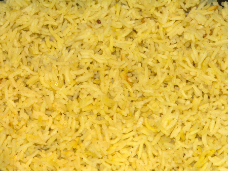 Basmati riced cooked with coconut milk, turmeric, and other spicesの写真素材