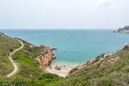 A hidden sandy beach in Po Toi Islands in Hong Kongの写真素材