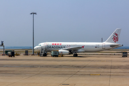 Dragonair flight in Hong Kong International Airport. About 90 airlines operate flights from HKIA to over 150 cities across the globe.のeditorial素材