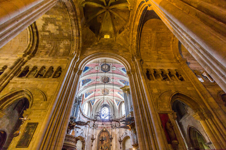 Inside view of Lisbon Cathedral which is a Roman Catholic Cathedral located in Lisbon Portugal. It is a mix of different architectural styles.のeditorial素材