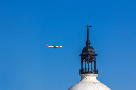 TAP Portugal flight flying over Lisbon sky. It is the flag carrier airline of Portugal headquartered at Lisbon Portela Airport which also serves as its hub.のeditorial素材