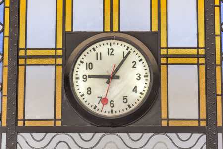 Old style clock in a railway stationの写真素材