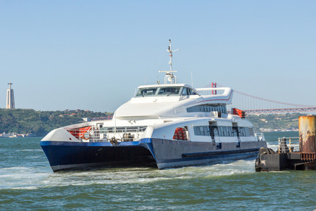 A yatch in Tagus river, Lisbon, Portugalのeditorial素材