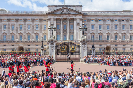 Royal Guards during traditional Changing of the Guards ceremony near Buckingham Palace. This ceremony is one of the most popular tourist attractions in London.のeditorial素材