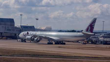 Qatar Airways airplane at London Heathrow Airport. Heathrow is the busiest airport in the United...
