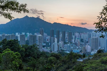 View of Tuen Mun in Hong Kong at the Sunset. Castle peak can be seen in the background.のeditorial素材