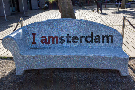 'I Amsterdam' sign on a park chair in one of Amsterdam's most popular city squares is Museumplein, Amsterdam, Netherlandsのeditorial素材