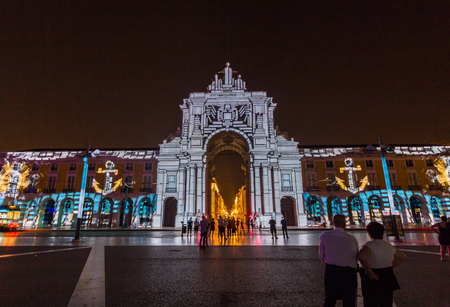 Rue Augusta arch in Commerce square at night in Lisboa, Portugal.のeditorial素材