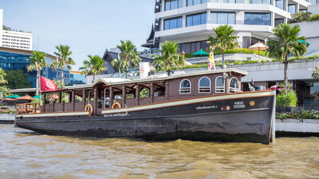 A pier at Royal Orchid Sheraton Hotel & Towers next to Chao Phraya river in Bangkok, Thailand.のeditorial素材