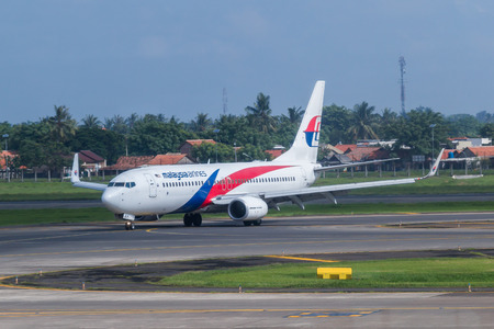 Malaysia Airlines plane on a runway of Soekarno-Hatta International Airport in Jakarta, Indonesia.のeditorial素材