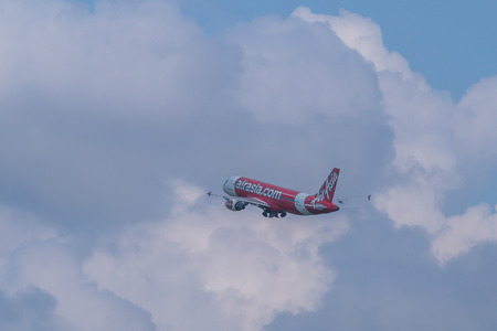AirAsia airplane departing from Soekarno-Hatta International Airport in Jakarta, Indonesia. AirAsia is the largest low-cost airline in the Southeast Asia.のeditorial素材