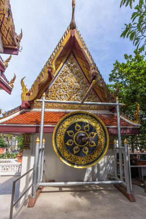 Mallet beating gong in Buddhist temple at the Golden Mount in Bangkok, Thailand. The Golden Mount is part of the Wat Saket temple located just outside the old royal city precincts.のeditorial素材