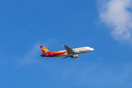 Hong Kong Airlines airplane departing from the Hong Kong International Airport. About 90 airlines operate flights from HKIA to over 150 cities across the globe.のeditorial素材