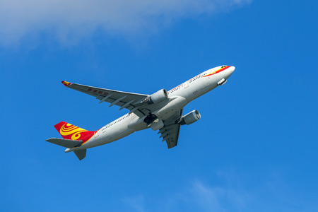 Hong Kong Airlines airplane departing from the Hong Kong International Airport. About 90 airlines operate flights from HKIA to over 150 cities across the globe.のeditorial素材