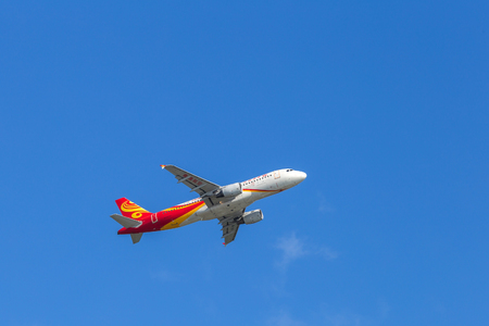 Hong Kong Airlines airplane departing from the Hong Kong International Airport. About 90 airlines operate flights from HKIA to over 150 cities across the globe.のeditorial素材