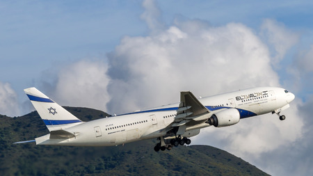 El Al Israel Airlines airplane departing from the Hong Kong International Airport. About 90 airlines operate flights from HKIA to over 150 cities across the globe.のeditorial素材
