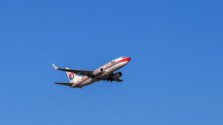 China Eastern Airlines airplane departing from the Hong Kong International Airport. About 90 airlines operate flights from HKIA to over 150 cities across the globe.のeditorial素材