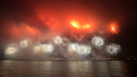 Fireworks show along Victoria harbor in Hong Kong, China.の写真素材