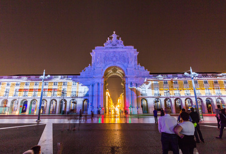 Rue Augusta arch in Commerce square at night in Lisboa, Portugal.のeditorial素材