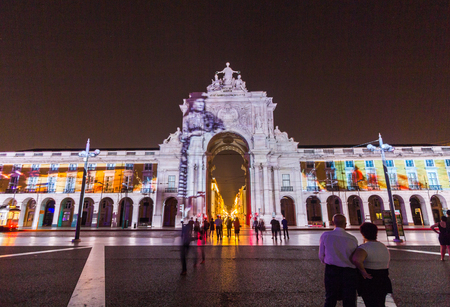 Rue Augusta arch in Commerce square at night in Lisboa, Portugal.のeditorial素材