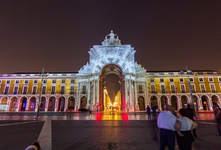 Rue Augusta arch in Commerce square at night in Lisboa, Portugal.のeditorial素材