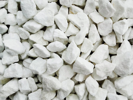 Pile  of white naturale   cracked  stones used to decorate the garden or parts of the house indoor...