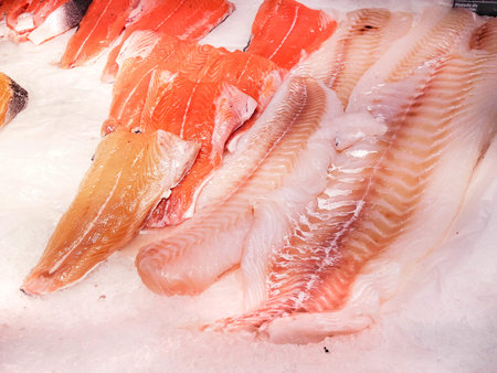Salmon fillet in ice t for sale at fish market 